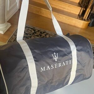 Gray Duffel Bag with Cream Straps